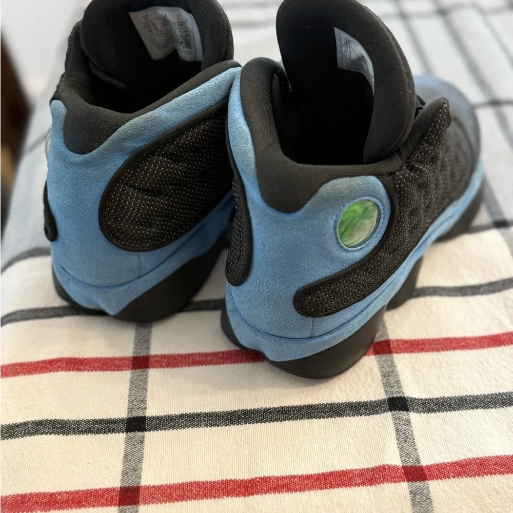 Jordan 13s in Black and Light Blue‎